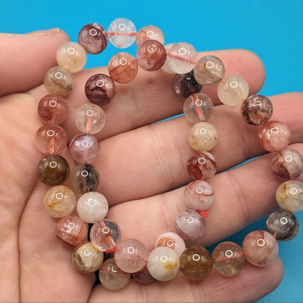 Beautiful rainbow filled golden healer and quartz bracelet
